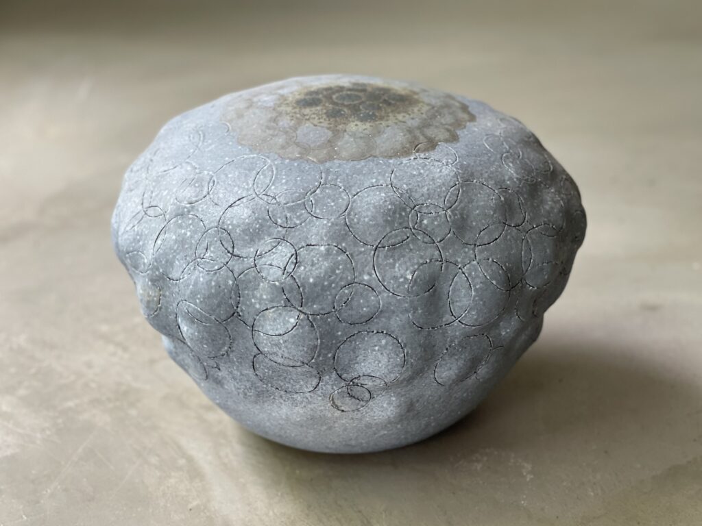 Non-flying object III, 2022, glazed stoneware, decal, ø 36 x 27 cm